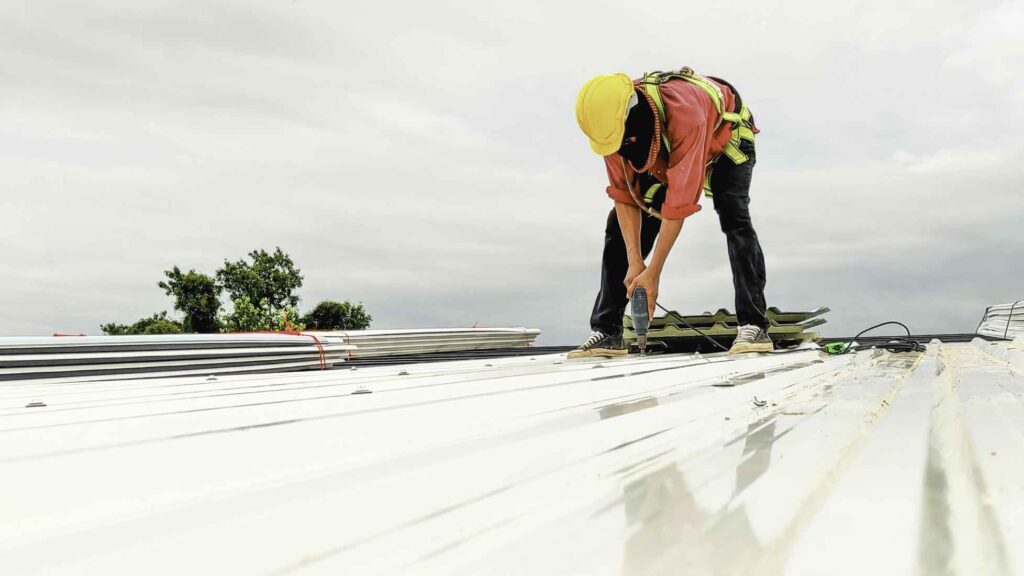 Commercial Roofing South Florida Worker on a roof